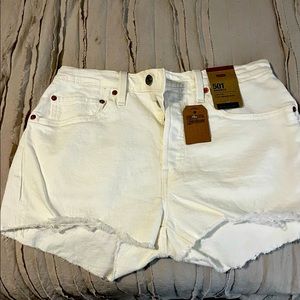Levis high rise shorts, white frayed on the bottom, jeans